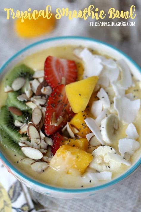 Tropical Smoothie Bowl Tropical Smoothie Bowl, Tropical Cafe, Tropical Fruit Smoothie, Tropical Smoothie Cafe, Tropical Smoothie, Yogurt Bowl, Smoothie Bowl Recipe, Smoothie Bowls, Tropical Fruit