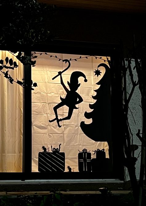 #silhouette #christmaswindow #elf #holidaywindow #windowdecor #window Winter Window Silhouette, Christmas Window Cricut, Christmas Garage Door Silhouette, Christmas Window Cutouts, Christmas Window Paper Decorations, Window Silhouette Christmas, Christmas Siloutte, Christmas Window Display Home Diy, Christmas Window Silhouettes