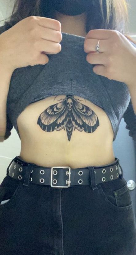 Left Side Chest Tattoo Female, Moth On Stomach Tattoo, Witchy Tattoo Ideas Thigh, Moth Tattoo Ideas For Women, Moth Stomach Tattoos Women, Sternum Moth Tattoo Women, Upper Belly Tattoo, Moth Tattoo Underbust, Moth Tattoo On Chest