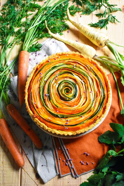 Carrot and Parsnip Vegetable Spiral Tart – GastroGays Carrot Parsnip Recipe, Carrot Tart, Carrot And Parsnip Recipe, Veggie Tart, Parsnip Recipes, Veggie Pies, Cauliflower Mushroom, Veggie Main Dishes, Vegetable Tart