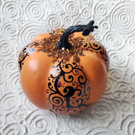 "This Large Orange Swirly Bling Pumpkin is a one of a kind artist creation! Not a real pumpkin! It will last forever! Hand painted black swirls and 10 ladybugs on a festive, fall foam pumpkin. For the bling, the top is adorned with assorted black, and orange glitter & sequins. This pumpkin will bring a dash of sparkle to any room!   See photos for other colors & sizes available.  THIS LISTING IS FOR ONE LARGE PUMPKIN Pumpkin is approximately 5.25\" tall, 6\" wide, 18.5\" circumference. Your uniq Painted Pumpkins Decor, Detailed Painted Pumpkin, Pour Painting Pumpkins, Glitter Pumpkins Halloween, Paint Pour Pumpkin, Fall Pumpkin Painting, Badazzel Pumpkin, Pumpkin Paint, Elegant Pumpkins