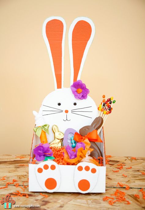 DIY bunny shaped Easter basket to make from a cardboard box. | at Non Toy Gifts Easter Photo Frames, Homemade Easter Baskets, Box Bunny, Easter Baskets To Make, Diy Bunny, Easter Crafts For Toddlers, Non Toy Gifts, Easter Bunny Basket, Easy Easter Crafts