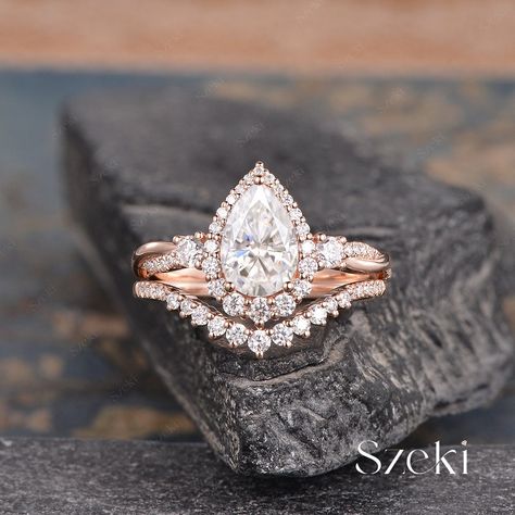 Rose gold pear engagement ring