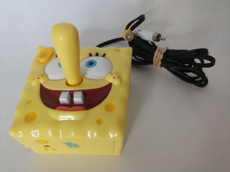 JAKKS Pacific SpongeBob SquarePants TV Video Game Plug and Play Joystick 2009. Condition is Used. Excellent condition. Tested. Requires 4 AAA batteries. Shipped with USPS Priority Mail.  This fun SpongeBob TV Games Video Game System puts 5 different SpongeBob games at your fingertips. Just plug it directly into your TV and play Bubble Pop, Super Chum Bucket, Invasion of the Hooks, Patrick and the Maze and Sandy’s Surf Adventure. No game console is required and the system is portable enough to so Plug And Play Video Games, Plug And Play, 2000s Things, Spongebob Tv, Early 2000s Toys, 2000 Toys, Spongebob Games, 2000s Childhood Memories, 2000s Memories