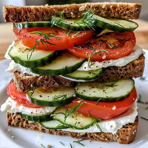 🥒🍅 A refreshing, crisp sandwich packed with flavor! #CucumberTomatoSandwich #FreshBites 🍽️ Cucumber Tomato Sandwich 🛒 Ingredients: 4 slices whole-grain bread 1 cucumber, sliced 2 tomatoes, sliced 1/4 cup cream cheese 1 tbsp fresh dill, chopped Salt & pepper to taste 👩‍🍳 Instructions: Prepare Spread: In a bowl, mix cream cheese, dill, salt, and pepper. Assemble Sandwiches: Spread cream cheese mixture on each slice of bread. Layer cucumber and tomato slices. Serve & Enjoy: Cut sandwiches in... Crisp Sandwich, Dill Salt, Cucumber And Tomato, Avocado Sandwich, Instagram Recipes, Grain Bread, Twisted Recipes, Sandwich Ingredients, Cucumber Sandwiches