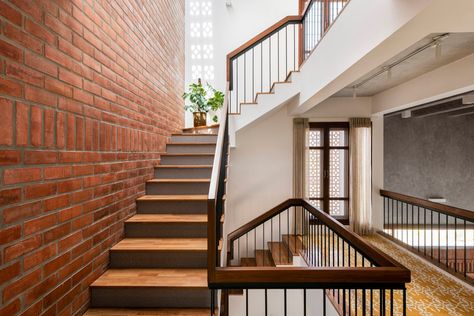 White walls and exposed brick highlight this Bangalore home's design | Architectural Digest India Brick Pathway, Brick Interior, Indian Home Design, Stair Case, Bungalow Design, Building A New Home, Interior Photo, City House, Exposed Brick