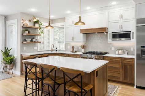 Designers share fresh ideas for bringing dynamic style to this classic kitchen palette Warm Contemporary Kitchen, Black Modern Farmhouse, Kitchen Drawer Organizer, Light Gray Cabinets, Kitchen Transitional, Walnut Shelves, Kitchen Countertop Materials, Metal Ceiling Lighting, Kitchen Hood