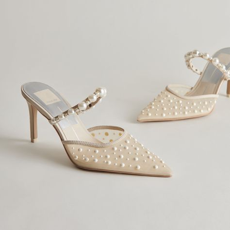 Timeless, modern, and femme all in one. KATIK PEARL features an uber sophisticated silhouette with a mesh design covered in delicate pearls. She’s perfect for bridal or wedding guest looks. Textile Upper Rubber Outsole Synthetic Sock + Lining 3.3" Heel Height Imported