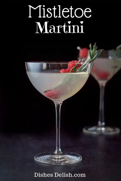 The combination of vodka, cherry brandy with the sweet and sour flavors gives this mistletoe martini a special taste that continues to satisfy with each sip. Some cocktails are made prettier by the garnish and this is one of them! #martini #cocktail #drink #dishesdelish Mistletoe Martini Recipe, Mistletoe Martini, Christmas Martini, Cherry Brandy, Martini Recipe, Festive Cocktails, Cocktail Drink, Winter Cocktails, Martini Recipes