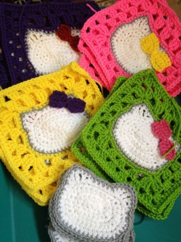 Hello Kitty squares in progress... Hello Kitty Crochet Square, Kawaii Granny Square Crochet, Hello Kitty Granny Square Pattern, Hello Kitty Crochet Blanket, Hello Kitty Granny Square, Kitty Granny Square, Crochet Cat Granny Square, Hello Kitty Crochet Pattern, Cat Granny Square