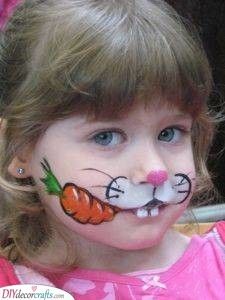 A Rabbit - With a Carrot Face Painting Farm Animals Easy, Farm Face Painting, Face Painting Farm Animals, Face Paint Rabbit, Farm Face Paint, Farm Animal Face Paint, Chicken Face Paint, Easter Face Painting Ideas, Face Painting Easter