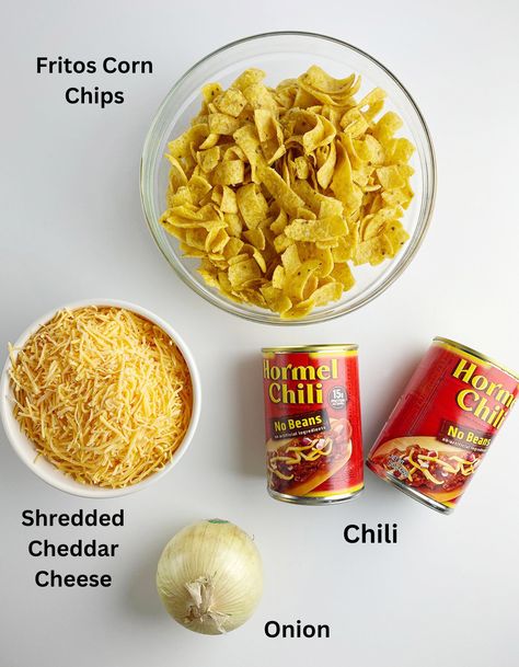 Sometimes you just need a little Frito Chili Pie and that's all there is to it. Here's your easy recipe! And I do mean EASY. #fritos #chili #supper #fritochilipie #framedcooks #kidfriendly Pepper Bellies Fritos, Chili With Fritos, Frito Meals, Fritos And Chili, Easy Frito Chili Pie, Frito Pie With Canned Chili, Walking Chili Fritos, Chili Frito Pie Recipe Easy, Frito Boats Recipes