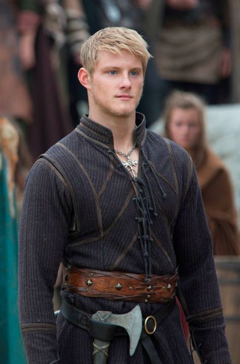 Björn Ironside is the eldest son of Ragnar Lothbrok and Lagertha. He is the third husband of Torvi and heir of Kattegat. Loyal and emulating his wise father, Björn had made a name for himself, following in his father's footsteps as a formidable warrior, leader, and explorer. He shares his father's thirst for adventure and wishes to explore faraway lands. Upon turning 12 and coming of age in Viking society, Björn received his arm ring from the then reigning Earl Haraldson. Björn had ye... Vikings Tv Show Costumes, Viking Outfit Male, Heathen Wedding, Fantasy Attire, Bjorn Vikings, Peasant Boy, Fair Costume, Costume Viking, Male Aesthetic