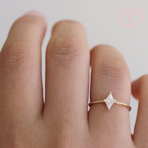 Delicate geometric engagement ring in 18k solid gold. The ring is set with two sparkly triangle cut diamonds in a form of a diamond rhombus. 18k solid gold | two ~0.1 carat triangle cut diamond (~0.2 carat in total)Diamonds parameters: VS clarity, color E-G, conflict freeRing's band: 1.3 mm Minimalist Engagement Rings, Elopement Celebration, Geometric Engagement Ring, Minimal Engagement Ring, Turquoise Diamond Rings, Crown Engagement Ring, We Eloped, Marquise Diamond Engagement Ring, White Opal Ring