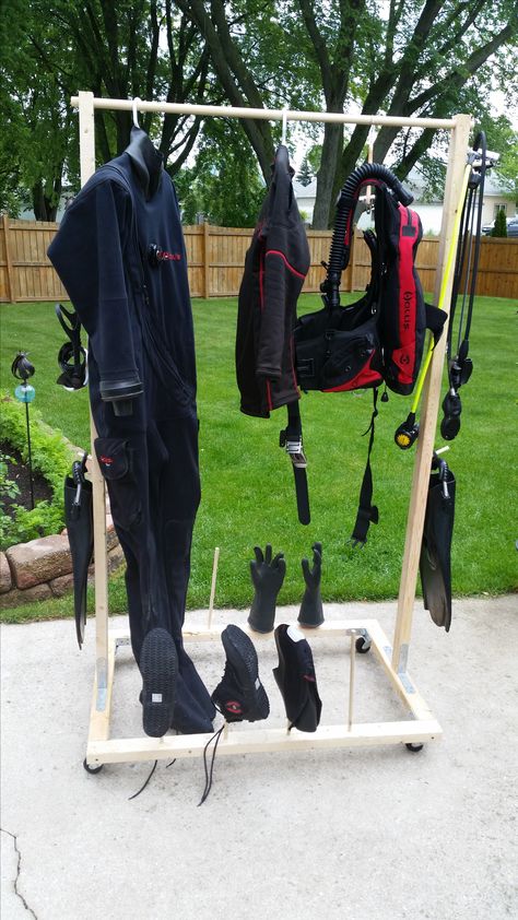 A scuba drying rack I made based off ideas I've seen on Pinterest.  I used spare 2x2 wood and some dowels. Wetsuit Drying Rack Room Ideas, Wetsuit Drying Rack, Scuba Storage, Surf Furniture, 2x2 Wood, Deco Surf, Scuba Diving Pictures, Scuba Equipment, Gear Room