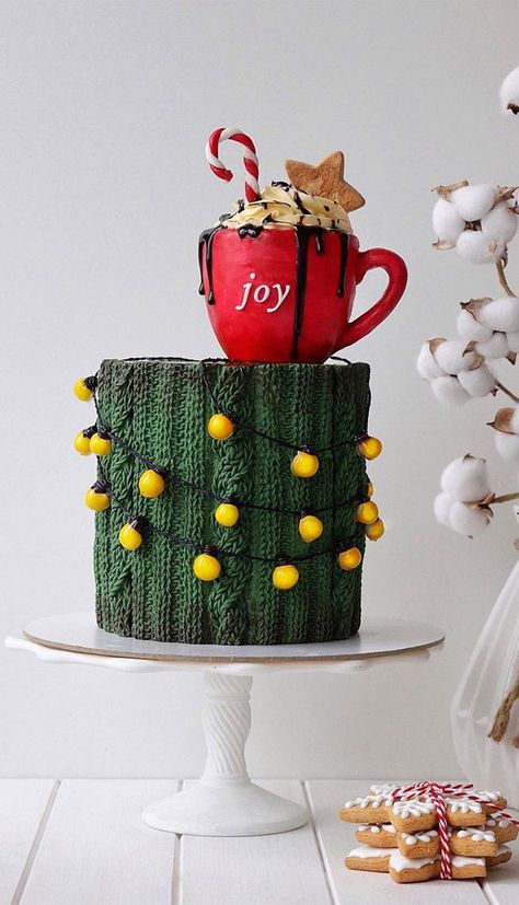 18. Green Sweater Cake We are so obsessed of this textured green sweater cake and decorated with Christmas lights and topped with red hot... Sweater Cake Ideas, Christmas Light Cake, Red Christmas Cake, Decorated Christmas Cakes, Winter Theme Cake, Winter Cake Ideas, Winter Themed Cake, Sweater Cake, Easy Christmas Cake Recipe