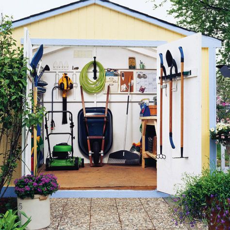 There's no doubt about it -- a well-organized tool shed can save you time, energy, and money: You won't waste 10 minutes looking for that trowel. You won't be frustrated moving the wheelbarrow and that extra bag of potting soil out of the way so you can get to your lawn mower. And you won't spend extra money to buy a set of gloves because you can't find yours. Shed Organisation, White Shed, Garden Shed Interiors, Storage Shed Organization, Shed Interior, Shed Organization, Garden Tool Shed, Shed Doors, Greenhouse Plans