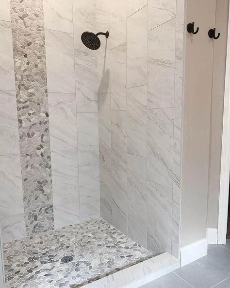 15 Vertical Tile Shower Ideas That Will Transform a Bathroom Tiles For Shower Walls, Vertical Tile Shower Ideas, Vertical Shower Tile, Stone Shower Floor, Large White Tiles, Vertical Tile, Large Shower Tile, Marble Shower Walls, Mosaic Shower Tile