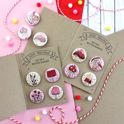 Perfectly cute little fairytale magical mushroom button badges to pin to your outfit, gift as party favours, pin to pennants, or add to your collection! These small badges are all 25mm in size, and feature a safety pin-back. They come securely packaged in a set of four on a protective backing card (made of recycled card) to ensure they arrive with you safely. Handmade in Scotland, this cute little button badge set is perfect to pin to your jacket, to add to your bag for a cute seasonal touch, or to bring a little flair to a camera strap! * Please note, these badges are not suitable for very young children due to sharp points and small parts. * Looking for more fairytale magical mushroom goodies? Click the links below to see my magical mushroom themed items: Wooden Pin Badge - https://www.e Pin Button Design, Store Inspiration, Magical Mushroom, Pin Button Badges, Pin Ideas, Button Badges, Diy Pins, Backing Card, Letterbox Gifts