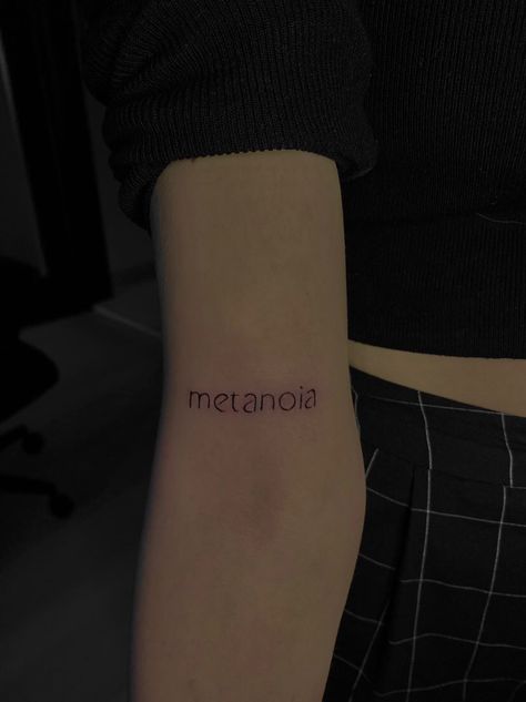 Tattoo metanoia, black and white arm tattoo Metanoia Aesthetic, Psychotic Wallpaper, Healing Process Tattoo, Psychology Tattoo Minimalist, Text Tattoo Arm, Psychology Tattoo, Rebirth Tattoo, Tattoo Text, Music Tattoo Designs