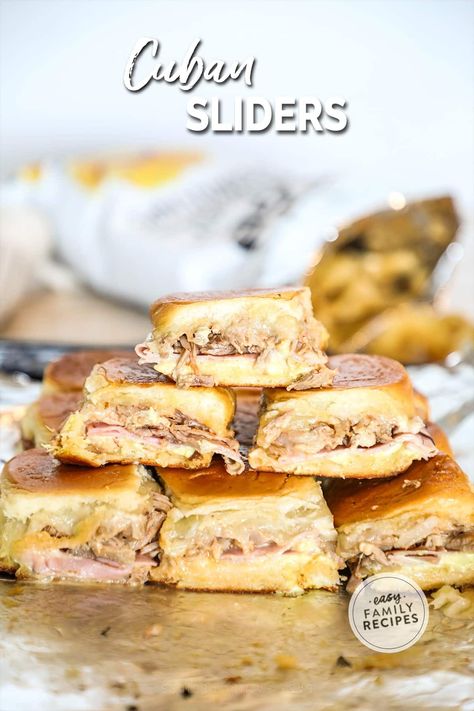 Cuban sandwich made easy! These Cuban sliders are made with soft and buttery Hawaiian rolls for an easy spin on the Floridian classic. These Hawaiian Roll Cuban Sliders are made with ham, pulled pork, Swiss cheese, pickles, and an easy mayo-mustard sauce, then brushed with garlic butter and baked for the most delicious cheesy Cuban sliders recipe! Hawaiian Roll Cuban Sliders, Hawaiian Roll Sliders Cuban, Cuban Appetizers For Party, Cuban Rolls, Cuban Sliders Hawaiian Rolls, Cubano Sliders, Cuban Sandwich Sliders, Easy Mayo, Cuban Appetizers