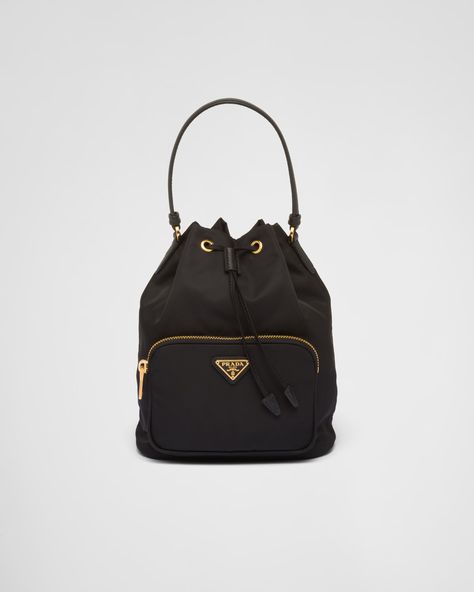 Black Prada Duet Re-nylon Bucket Bag | PRADA Prada Bucket Bag, Prada Nylon Bag, Soft Contemporary, Bag Obsession, Prada Nylon, Drawstring Bucket Bag, Handbag Wallet, Triangle Logo, Black Shoulder Bag