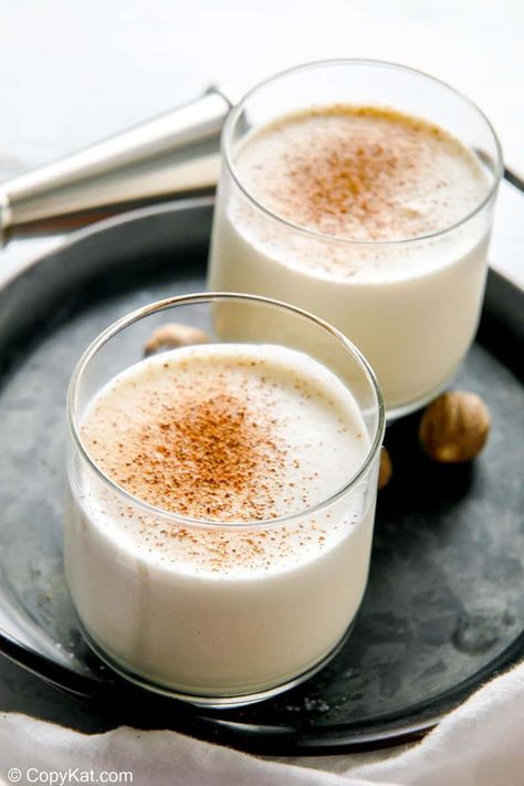 Milk Punch is a cool and creamy cocktail made with bourbon, rum, brandy, ice cream, and milk. Get the easy recipe and learn how to make the best milk punch. A boozy milkshake is perfect for the holidays and hot summer days. This classic southern cocktail is popular in the south and a featured drink in many New Orleans restaurants. #milkshake #cocktailrecipe #bourbon #christmasdrinks #christmascocktails Brandy Ice, Brandy Milk Punch, Bourbon Milk Punch, Milk Punch Recipe, Southern Cocktail, Watermelon Syrup, Milk Punch, Apple Pucker, Boozy Milkshake