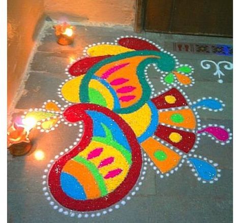 We received some really beautiful entries for our Rangoli contest so you can guess how difficult the decision to select a winner might be...therefore we're putting up the three best entries for you to choose from...LIKE the rangoli you want to see win by 5th December and the one with most 'likes' will win!!!    ENTRY 2 by Poonam Jadhav  Click here and LIKE:  http://www.facebook.com/photo.php?fbid=505567362807018=a.158433857520372.31603.158432820853809=1 Sari Painting, Artistic Rangoli, Rangoli Peacock, Diya Rangoli, Latest Rangoli, Dots Rangoli, Rangoli Colours, Rangoli Art, Colorful Rangoli