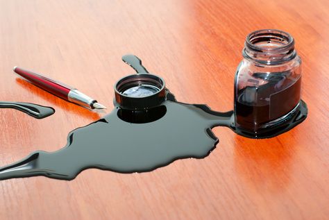 black ink spill_shutterstock_70536289 Ink Stain Removal, Printer Ink Cartridges, Mineral Spirits, Ink Blot, Make Up Your Mind, Ink Stain, Fountain Pen Ink, Cotton Ball, Pen Ink