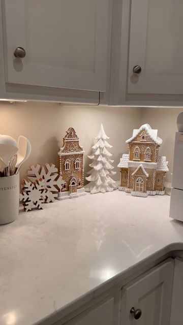 Winter Decor Inspiration, Small Christmas Coffee Bar Ideas, Christmas Decor Ideas For Counter Tops, Winter Wonderland Kitchen Decor, Classy Gingerbread Decorations, Gingerbread Village Decor, Elegant Gingerbread Decor, Christmas Decorated Living Room, Christmas Village On Top Of Cabinets