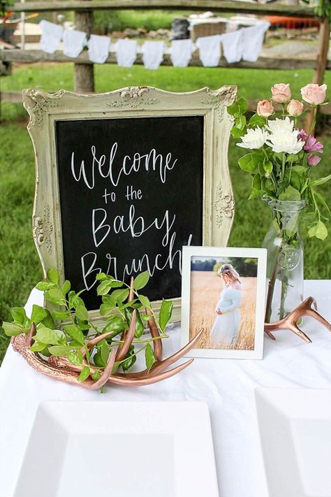 Our Frame #16 with custom hand-lettering accented by our Rose Gold Antlers creates a lovely welcome table for this surprise baby brunch! Letters For Baby Shower Table, Welcome Table Baby Shower Ideas, Baby Shower Entrance Table, Baby Shower Welcome Table, Tea Party Baby Shower Theme, Baby Shower Greetings, Baby Lunch, Baby Brunch, Baby Table