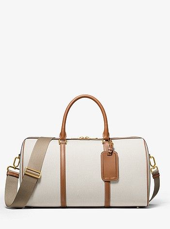 Mkc X 007 Bond Cotton Canvas And Leather Weekender Bag | Michael Kors Michael Kors Luggage, Canvas Weekender Bag, No Time To Die, Leather Duffel Bag, Leather Weekender Bag, Leather Duffel, Leather Weekender, Weekend Escape, Trunk Bag