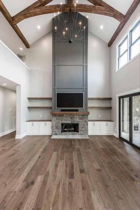 JR Builders Entertainment Center Ideas Vaulted Ceiling, Entertainment Center With Vaulted Ceilings, Electric Fireplace Tall Ceilings, Floor To Ceiling Fireplace With Tv, Barn Fireplace, Open Floor Plan Decorating Ideas, Fireplace Shelving, Black Fireplace Wall, Shelves Around Fireplace