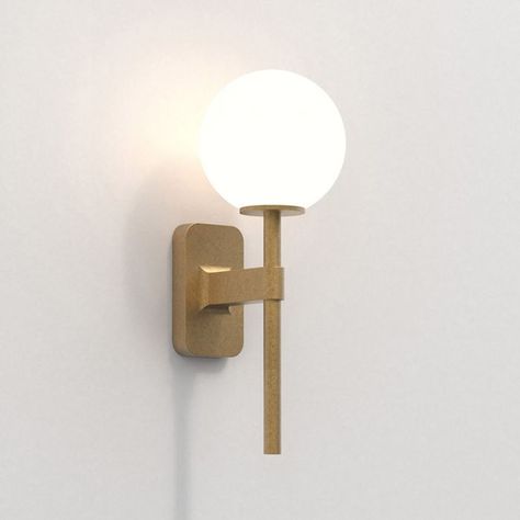 Modern bathroom wall light in an antique brass finish. Wall bracket only, Tacoma shades available to purchase separately Colour: Antique Brass Material: Mild Steel IP Class: IP44, Class 1 Power Source: Mains voltage Bulb: Max 3.5W LED G9 Capsule. Dimmable with compatible dimmer switch and dimmable bulb Dimensions:Overall - H 270 x W 70 x D 135mmBack Plate - H 125 x W 70 x D 20mmWith Shade - H 352 x W 135 x D 173mm Interior Wall Lights, Astro Lighting, Chrome Lamp, Bracket Lights, Brass Wall Light, Wall Bracket, Direct Lighting, Bathroom Wall Lights, Dimmable Lamp