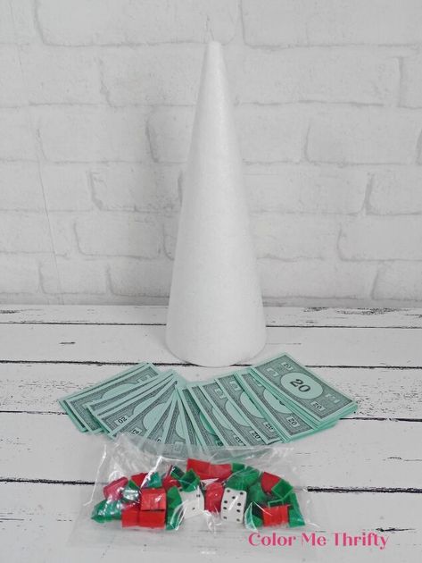 Monopoly Christmas Tree, Board Game Christmas Tree, Monopoly Crafts, Christmas Monopoly, Rosette Ornaments, Money Christmas Tree, Monopoly Pieces, Monopoly Money, Reindeer Games