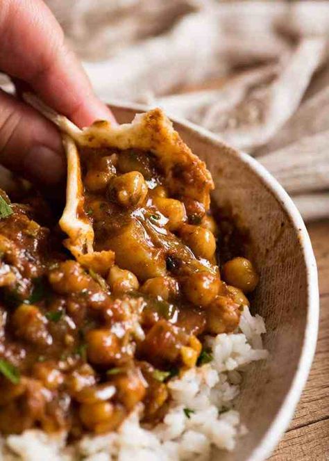 Close up of Chickpea Curry (Chana Aloo) being scooped up with Easy Soft Flatbread Potato Delight, Chana Aloo, Chickpea And Potato, Soft Flatbread, Chickpea And Potato Curry, Chickpeas Curry, Easy Chickpea Curry, Tin Eats, Aloo Curry