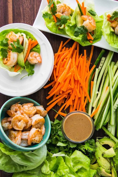 Shrimp Lettuce Wraps loaded with fresh veggies and juicy shrimp. The peanut sauce is exceptional and surprisingly simple. Lettuce wraps are a low carb, healthy dinner idea and they always disappear fast! | natashaskitchen.com Sauce For Lettuce Wraps, Different Types Of Food, Shrimp Wraps, Shrimp Lettuce Wraps, Peanut Dipping Sauce, Juicy Shrimp, Lettuce Wrap Recipes, Salad Recipes For Dinner, Idee Pasto Sano