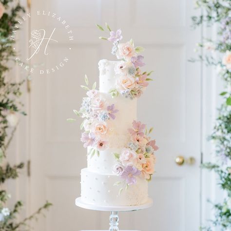 Wedding Cake With Pastel Flowers, Spring Pastel Wedding Cake, Pastel Wedding Cake Flowers, Wedding Pastel Decoration, Pastel Flower Wedding Cake, Pastel And Gold Wedding, Wedding Floral Cake, Colourful Pastel Wedding, Spring Flower Wedding Cake