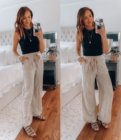 Are you in the mood for some pants that will make you feel relaxed? These flowy, elastic waist linen pants offer a hard-to-beat silhouette and comfort. Chic and effortless, these wide leg linen pants are available in three other color options. #linenpants #wideleglinenpants #whitelinenpants #summerstyle #summerfashion #affordablesummerfashion Spring Loungewear Outfits, Old Navy Wide Leg Linen Pants Outfit, How To Style Linen Pants Casual Summer, Linen Pants Vacation Outfit, Khaki Linen Pants Outfit Summer, Dress Up Linen Pants, Outfits With Wide Leg Linen Pants, High Waisted Linen Pants Outfits, Linen Pants Styling