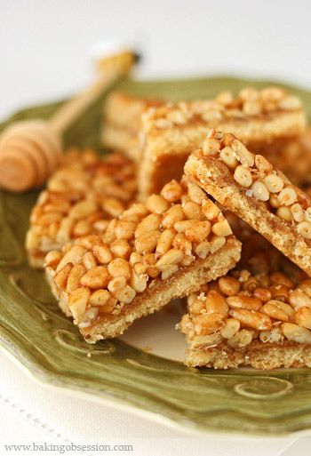 I LOVE pine nuts & honey... Pine Nut & Honey Squares Pine Nut Recipe, Pine Nut Desserts, Pinenut Cookies Recipes For, Honey Walnut Shortbread Bars, Honey Nut Clusters, Pine Nuts Recipes, Turtle Squares Pecans, Paleo Pescatarian, Pine Nut Cookies