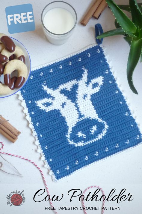 The Crochet Cow Potholder is a tapestry crochet potholder inspired by the Farmhouse life. It has a functional design, without any gaps or holes. A compact and cozy look that is just right for your kitchen! #crochet #tapestrycrochet #tapestry #kitchendecor #crochetpotholder #crochetkitchen #cow #potholder #trivet #freecrochetpattern #free #pattern #cotton #crochetcow #farmhouseanimals #rusticcrochet #diy #craft #uncinetto #haken Cow Potholder, Crochet Hot Pad, Crocheted Cow Pattern, Crochet Potholder Patterns, Crochet Hot Pads, Crochet Pig, Crochet Horse, Crochet Geek, Potholder Patterns