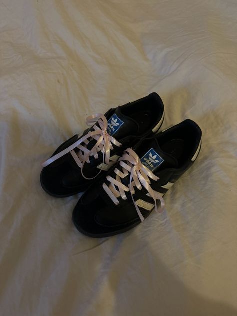 Black and white adidas sambas with pink ribbon laces Adidas Ribbon Laces, Samba Ribbon, Samba Ribbon Laces, Adidas Sambas With Ribbon, Adidas Samba Ribbon Laces, Black Sambas Pink Ribbon, Adidas Samba With Ribbons, Black Sambas Pink Laces, Sambas With Pink Laces