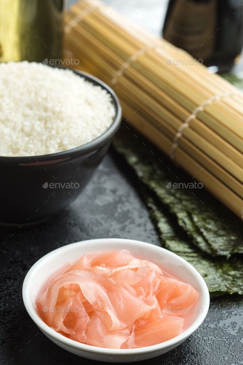 Pickled sushi ginger slices. by jirkaejc on PhotoDune. Pickled sushi ginger slices in bowl. Pink ginger on black table. Sushi Ginger, Pink Ginger, Ginger Slice, Black Table, Pickles, Ginger, Condiments, Art Design, Bowl