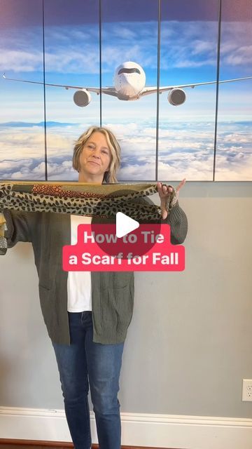 Travel Tips Pilot Wife | ✈️ How to Tie a Scarf for Your Travel Outfit 🍁 Type FALL for all details.
Fold scarf in half.
Lay it against the back of your neck with one... | Instagram Wrap A Scarf Around Neck, Different Ways To Wear Scarf, How To Wrap A Scarf Around Neck, How To Scarf Wrap, Tying Scarfs How To Neck Scarves, Tie Scarf How To Neck Scarves, How To Tie Scarf Around Neck, How To Tie A Scarf Around Your Neck, How To Tie A Scarf