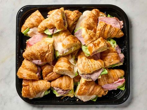 overhead shot of costco party platter of croissant sandwiches Sandwich Platter Ideas Trays, Diy Sandwich Platter, Croissant Sandwich Party, Sandwich Party Platters, Sandwich Platters For Parties, Croissant Platter, Sandwiches Party Tray, Costco Party Platters, Costco Party