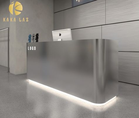 Reception desk with custom logo
stainless steel material
Gold and silver with lights to increase the sense of luxury Cash Desk Design, Office Front Desk Design, Desk Table Design, Reception Desk Design Ideas, Grey Reception Desk, Stainless Steel Reception Desk, Beauty Salon Reception Desk, Led Reception Desk, Shop Reception Desk