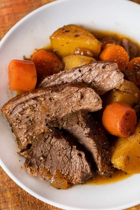 Easy Rump Roast is a hearty, simple roast for Sunday dinner. Tender flavorful slow roasted beef with potatoes and carrots. A delicious, easy one pot meal. #dinner #beef #braisedbeef #roastedbeef #rumproast #carrots #potatoes #dinnerthendessert Slow Cooker Apple Cider, Rump Roast, Slow Cooker Kitchen, Beef Rump, Instant Pot Pot Roast, Dinner Beef, Classic Pot Roast, Roasted Beef, Carrots Potatoes