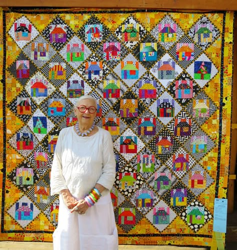 Freddy Moran of Orinda CA in front of her quilt "Houses on Point" (80″ square). 2015 Sisters Outdoor Quilt Show. Photo by First Light Designs. Wonky Houses, House Quilt Blocks, Outdoor Quilt, House Quilt Block, House Quilt Patterns, Quilt Modernen, House Quilts, Quilt Show, Quilt Art