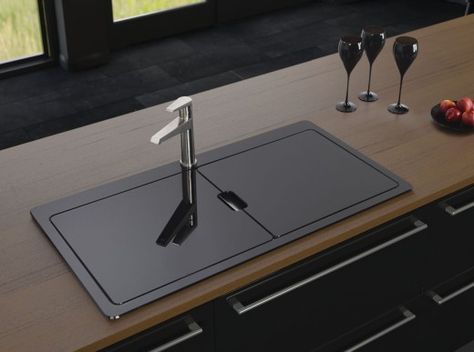 You may remember my last blog was all about concealed kitchens… well the trend has now found its way into sinks too, with designs that are hidden beneath a glass cover for a sleek, streamlined look. Astracast’s Vantage Sio sink in black glass and brushed steel is a perfect example and the glass covers can also double as a chopping board or drainer, so you can increase workspace in the kitchen at the same time. Rustic Wood Countertops, Sink Trends, Kitchen Sink Cover, Kitchen Sink Lighting, Stainless Steel Double Bowl Kitchen Sink, Black Stainless Steel Kitchen, Small Kitchen Sink, Double Kitchen, Outdoor Kitchen Countertops