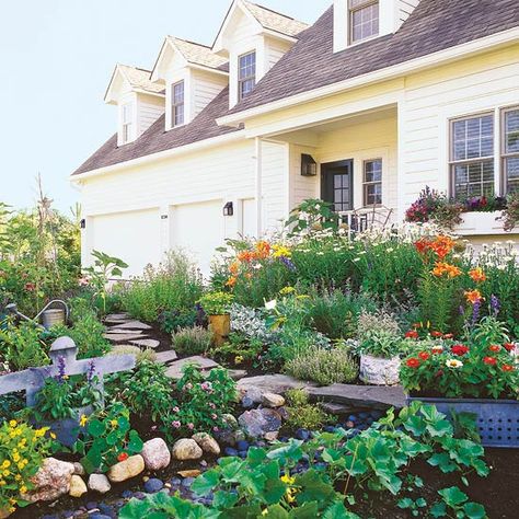 This flower-filled front yard garden incorporates lots of herbs and vegetables, too -- so harvesting fresh, homegrown produce is a breeze: http://www.bhg.com/gardening/landscaping-projects/landscape-basics/front-yard-flower-power/?socsrc=bhgpin032514edibleplants&page=12 Garden Wallpaper, Edible Landscaping, Pollinator Garden, Have Inspiration, Front Yard Garden, Edible Plants, Flowers Wallpaper, Garden Cottage, Landscape Projects